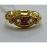 An 'antique' 18ct gold ruby and diamond set ring 11