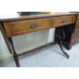 An early 20thC string inlaid burr walnut veneered sofa table with two frieze drawers,