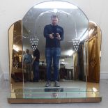 A mid 20thC Art Deco inspired round arched mirror,