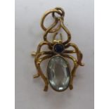 An 'antique' 9ct gold gem set spider brooch 11