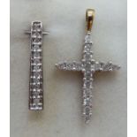 A 9ct gold backed diamond set crucifix pendant;