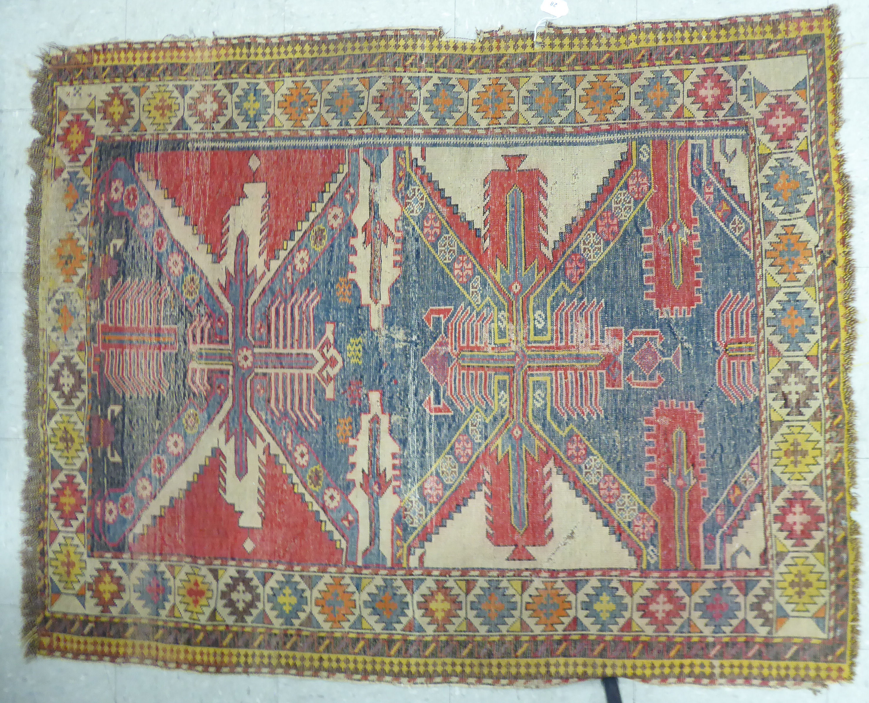 A Shirvan rug, decorated with repeating stylised designs, - Image 2 of 2