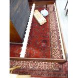 A Persian style, machine made rug,