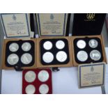 Four sets of two 5 and two 10 dollar Royal Canadian Mint Olympic coin proof coins,
