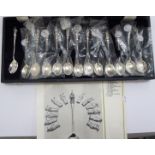 A set of thirteen silver apostle spoons modern London marks cased 11