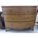A Regency mahogany three drawer bow front dressing chest,