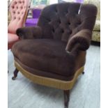 A 1920s nursing chair, part button upholstered in brown fabric,