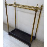 A late Victorian brass twelve division stickstand,