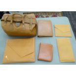 A 'vintage' stitched tan coloured hide Gladstone bag;