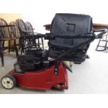 A Mountfield Quantum 35 petrol driven lawn mower 16''cut with a grass box BSR