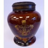 A mid 19thC streaky brown glazed stoneware tea canister of squat, waisted baluster form,