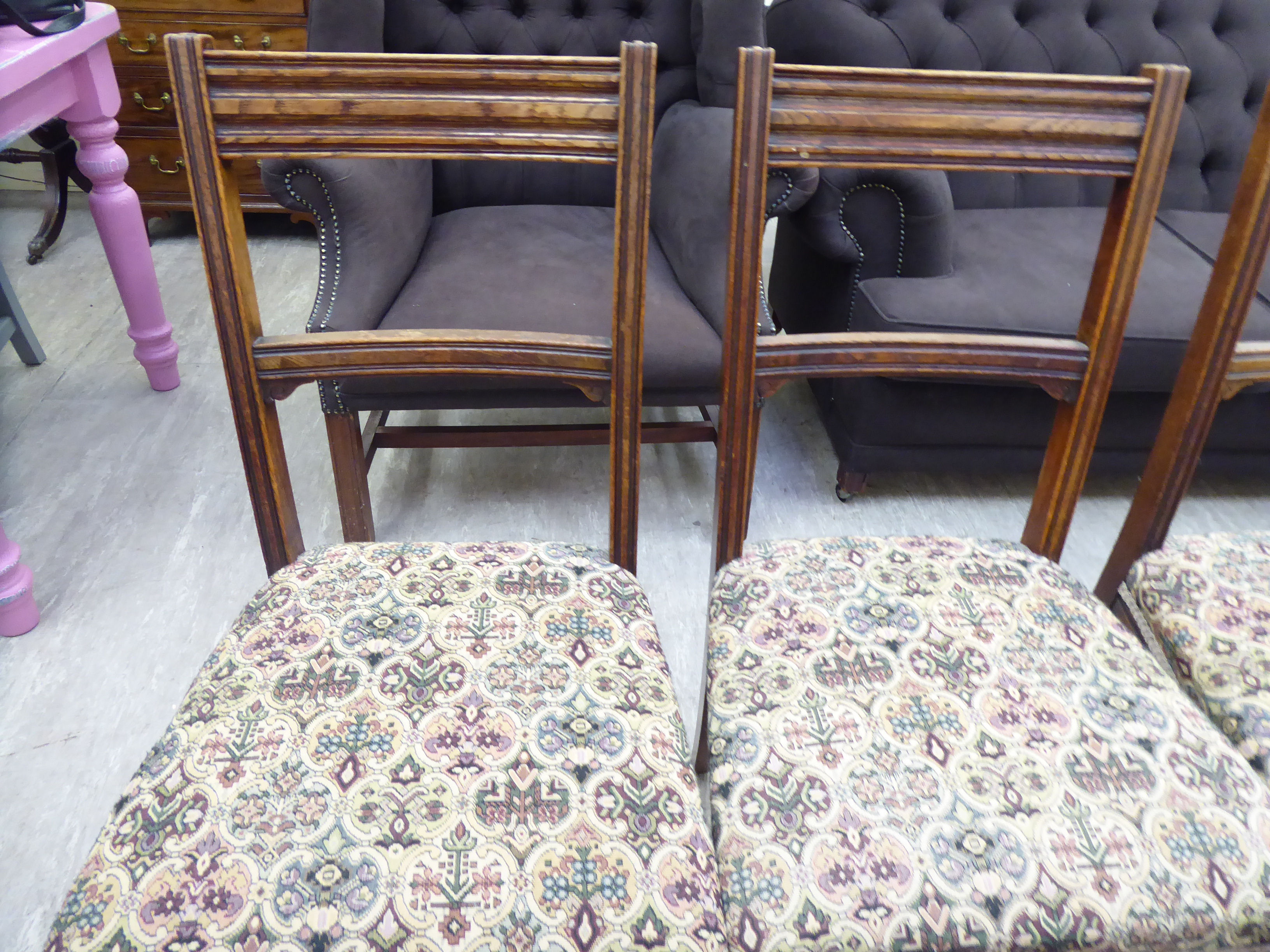 A set of five early 20thC stained oak framed bar back dining chairs with stylised patterned fabric - Image 2 of 3