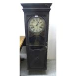 A late 19thC International Time Recording Company mahogany cased 'Bundy Time Recorder' clock with a