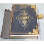 An early 20thC hide and gilt metal bound family Bible SR