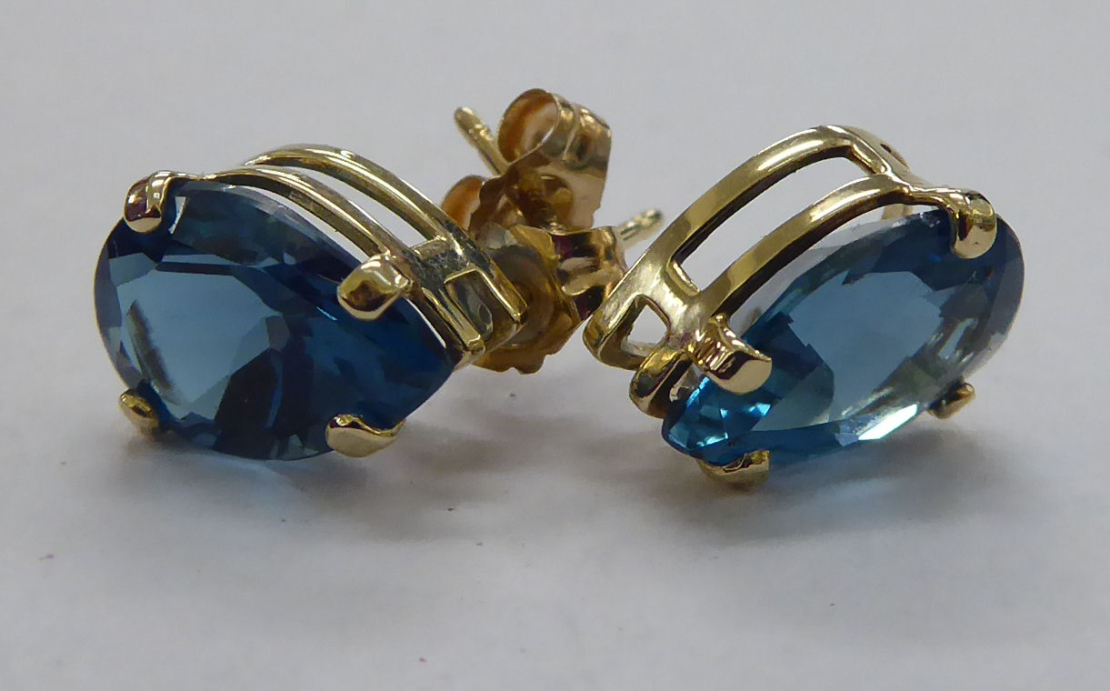 A pair of 9ct gold, blue topaz,