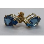 A pair of 9ct gold, blue topaz,