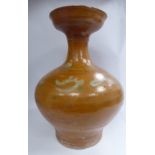 A Chinese 'antique' pottery vase of bulbous form with a narrow, waisted neck,