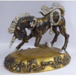 A Wedgwood china model, a bowing unicorn,