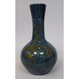 An Elton streaky blue and green glazed bulbous bottle vase,