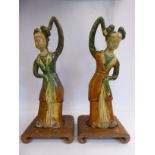 A pair of 'antique' Sancai terracotta dancing female figures 12''h