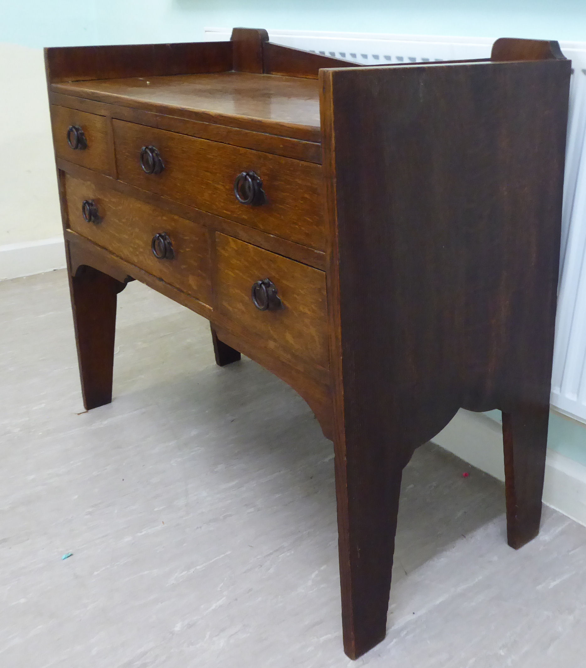 An early 20thC Arts & Crafts boarded oak dressing chest in the manner of Liberty, - Image 3 of 7