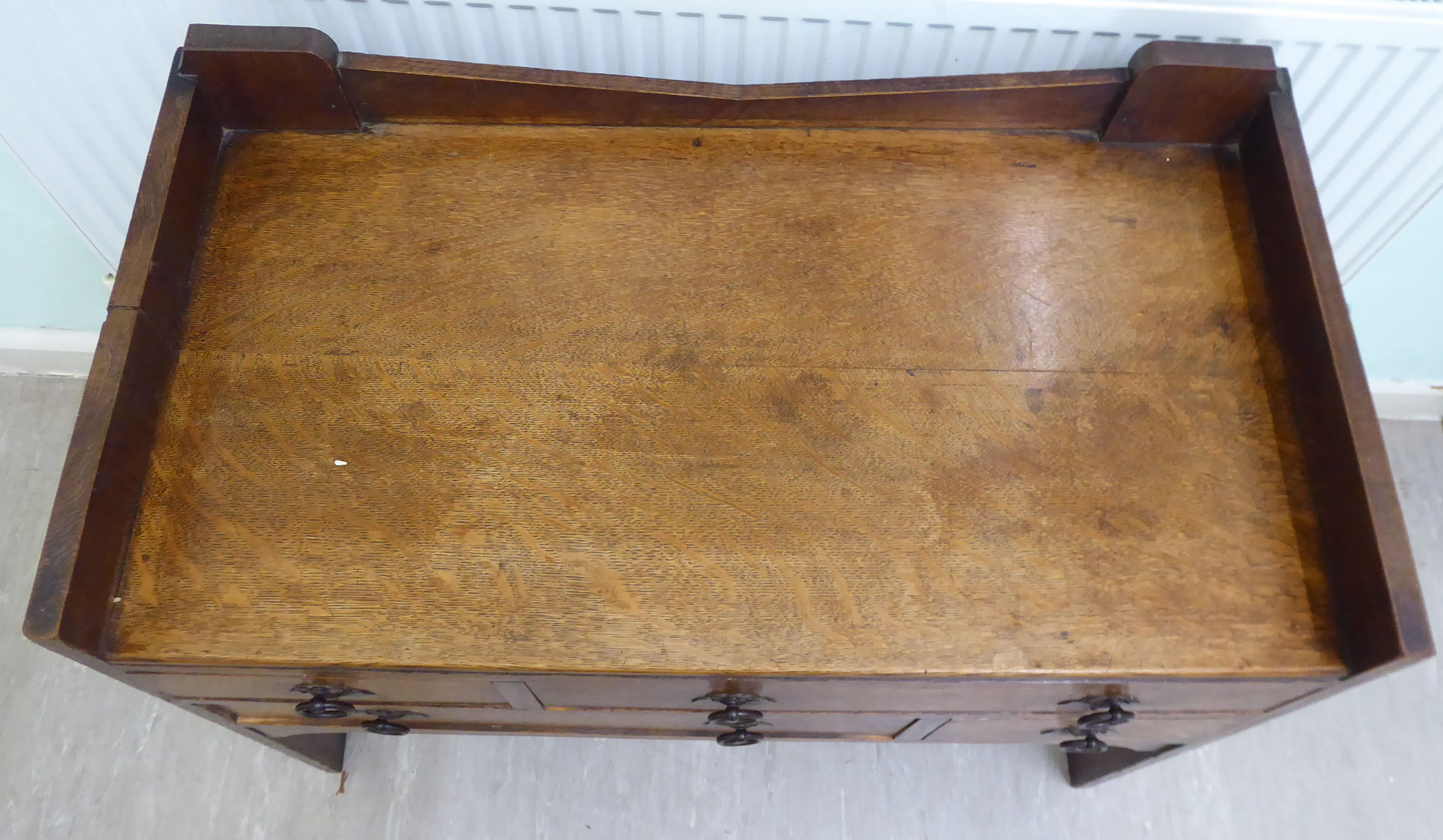 An early 20thC Arts & Crafts boarded oak dressing chest in the manner of Liberty, - Image 2 of 7