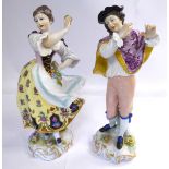 A pair of early 20thC Continental porcelain dancing figure, on scrolled,