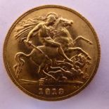 A George V half sovereign,