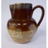 A late Victorian Doulton Lambeth two tone brown glazed stoneware harvest jug with an applied silver