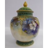 A Royal Worcester china pot pourri vase of segmented bulbous form, having a cover and finial,