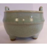 A Chinese celadon glazed porcelain tripod censor 3.