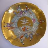 A late 19th/early 20thC Chinese porcelain bowl, decorated with figures amongst crashing waves,