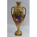 A Royal Worcester china twin handled vase of tapered, ovoid form,