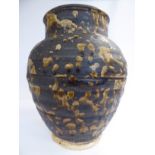 A Chinese pottery vase of baluster form,