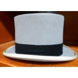 A Woodrow & Sons grey top hat approx.