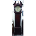 An early 19thC mahogany longcase clock with a double arched pediment,