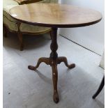 A George III mahogany pedestal table, the top raised on a tapered,