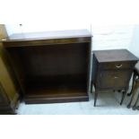 A modern ebony inlaid mahogany finished two tier, open front bookcase,
