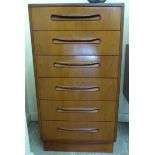 A G-Plan teak dressing chest with six graduated drawers,