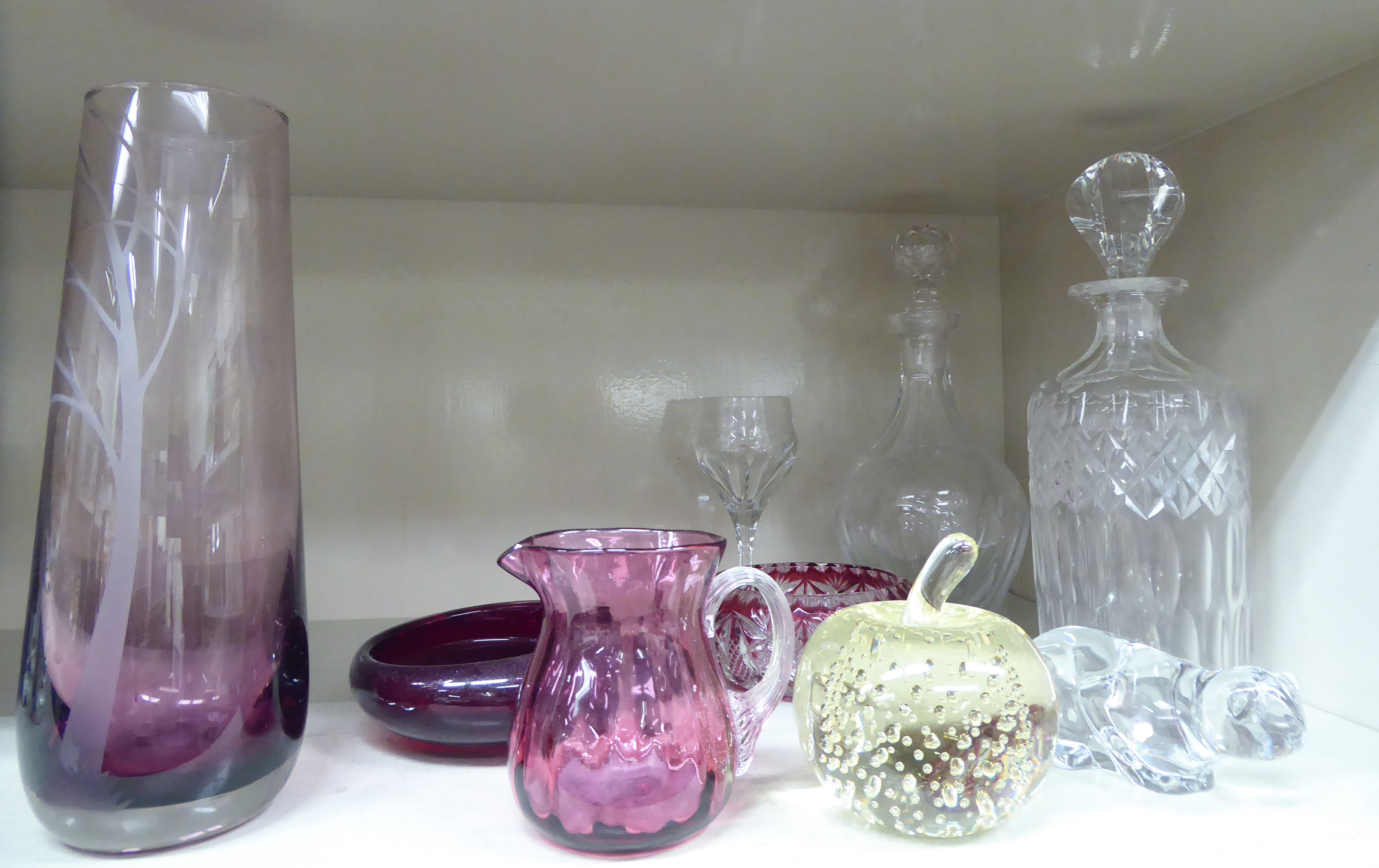 Decorative glassware: to include a tapered, misted maroon coloured vase,