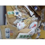 An uncollated collection of postage stamps, mainly British,