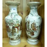 A pair of early 20thC Satsuma earthenware vases of baluster form,