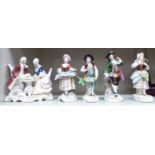 Five early/mid 20thC Continental ceramic figures: to include two flower sellers 6''h OS4