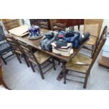 An early 20thC oak refectory table,