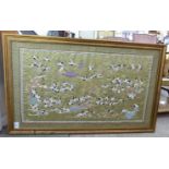 An Oriental coloured silk embroidered tapestry picture,