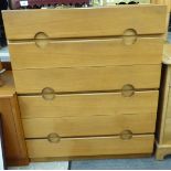 A G-Plan teak dressing chest with six graduated drawers, incorporating cut-out handles,
