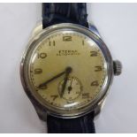 A 1950s Eterna stainless steel cased wristwatch, the automatic movement faced by an Arabic dial,