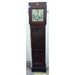 An early 20thC stained oak longcase clock, the hood with a square window,