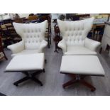 A pair of G-Plan rosewood framed, cream coloured hide, button upholstered easy chairs,