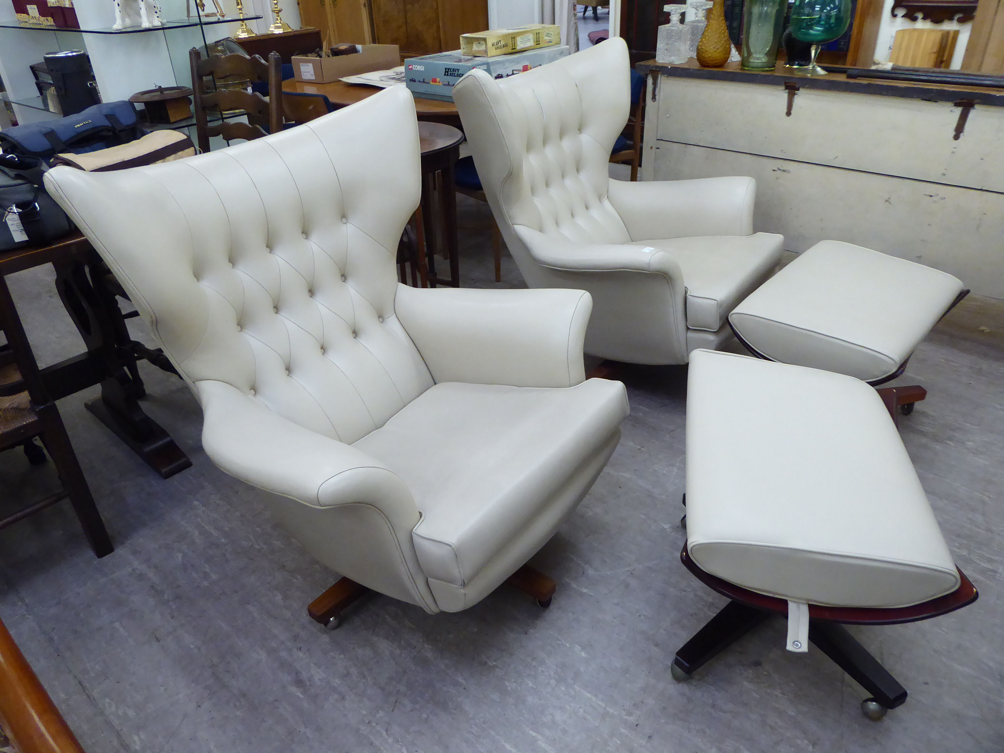 A pair of G-Plan rosewood framed, cream coloured hide, button upholstered easy chairs, - Image 2 of 5